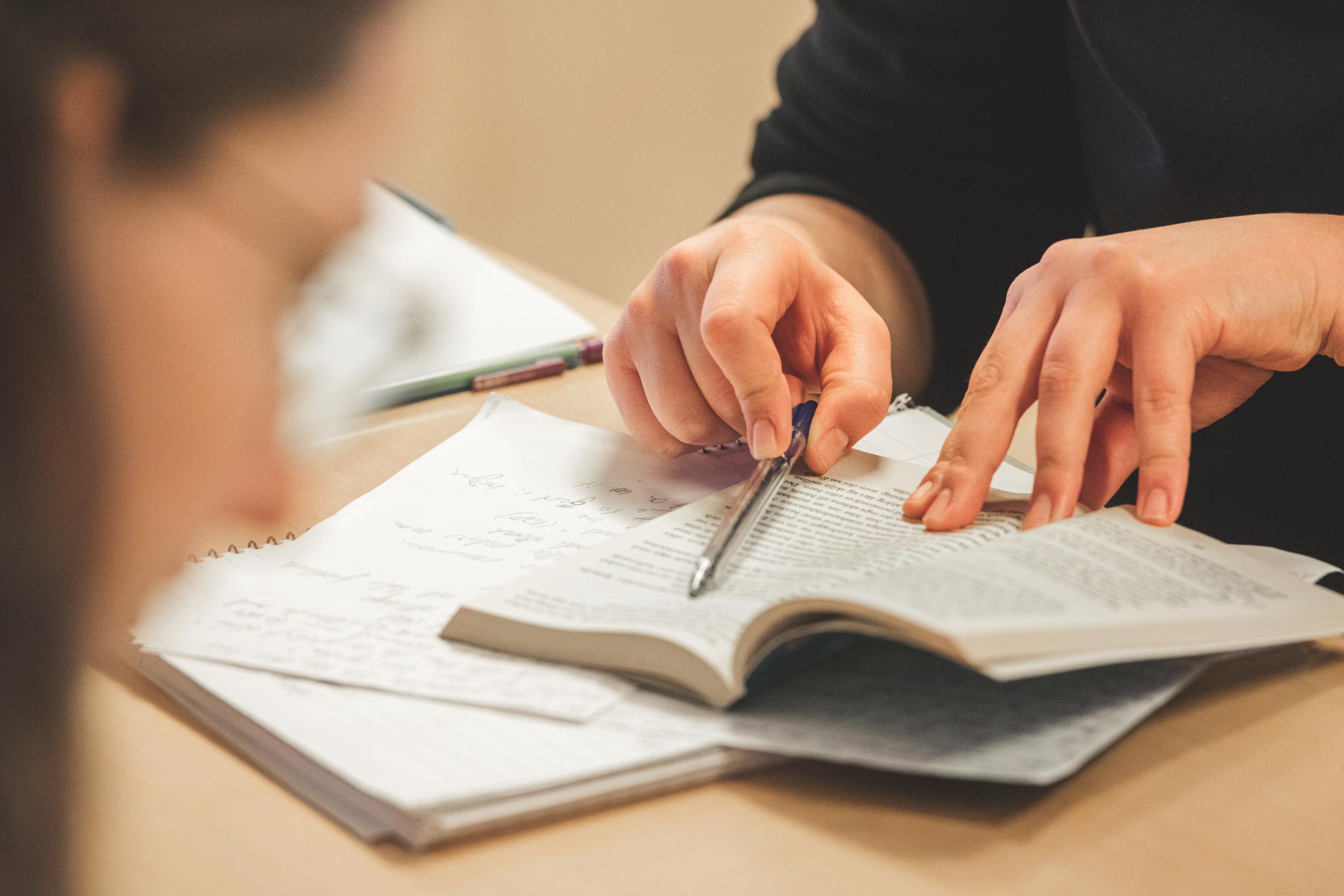 Students with open books.